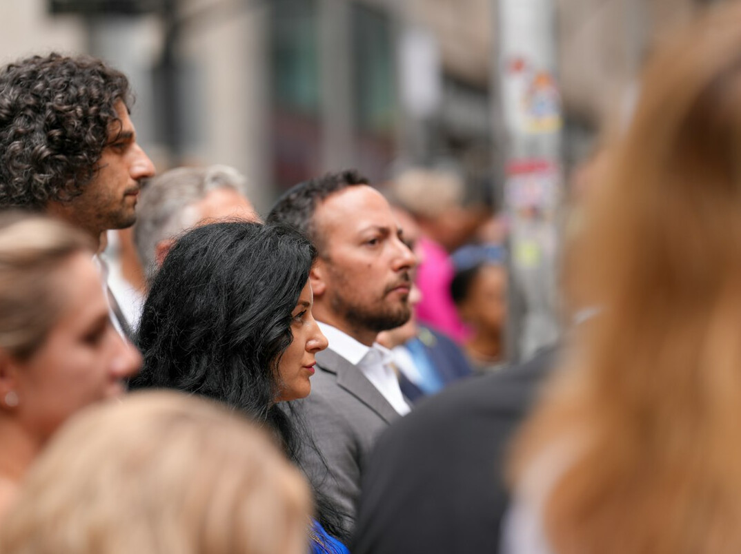 crowd arguing in street