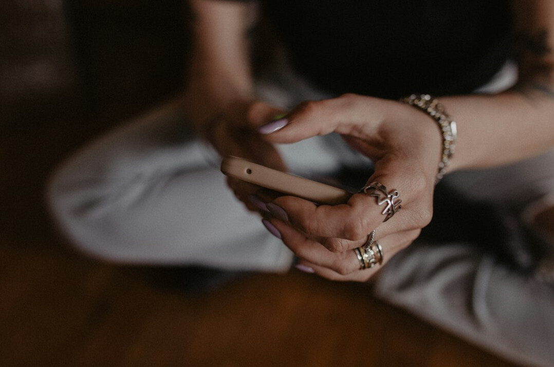 person meditating away from phone
