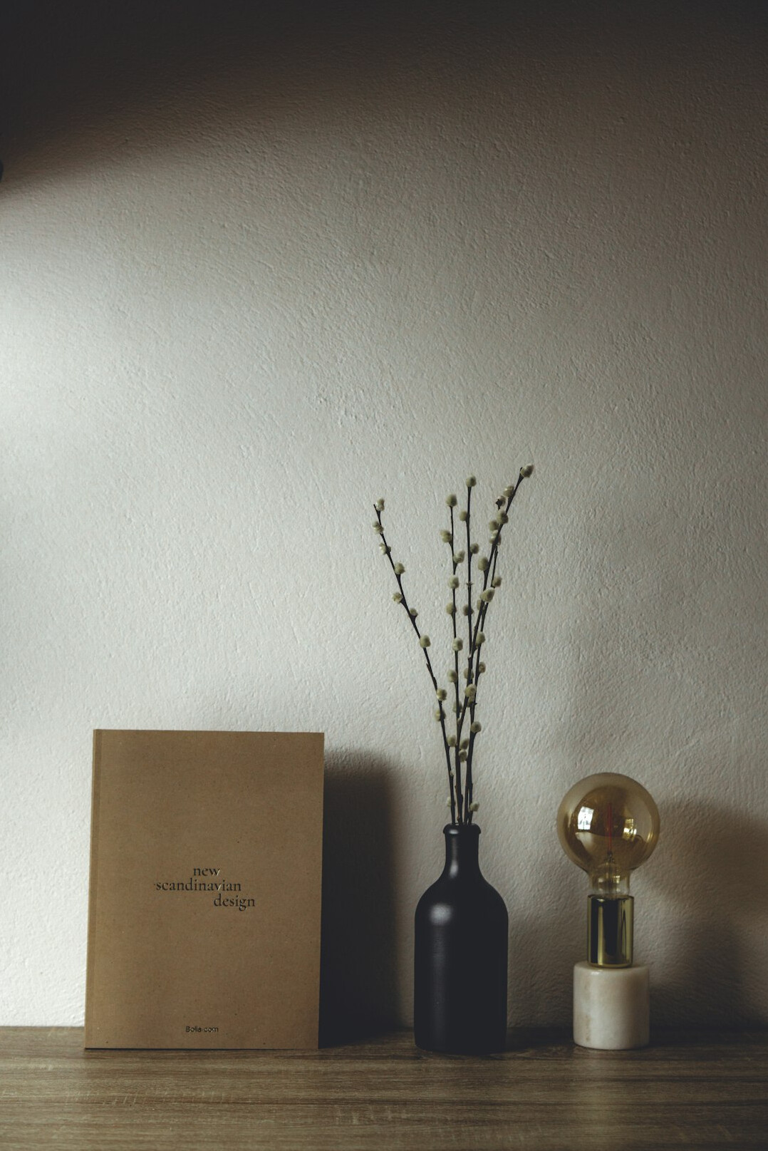 Close-up of old archival documents and research folders on a wooden desk